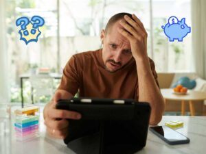 Homme désespéré qui vérifie son compte en banque